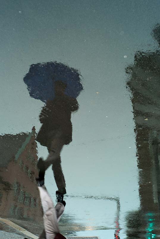 Blue umbrella reflection