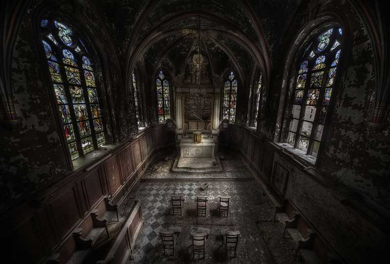 This large abandoned church had some very nice chairs left inside and even a coffin for a baby